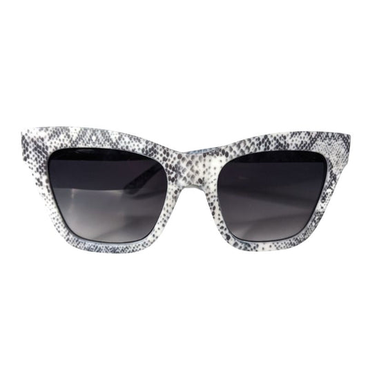 Front view of black and white snake print polarized cateye sunglasses
