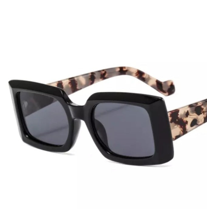 Black polarized sunglasses with detailed temples