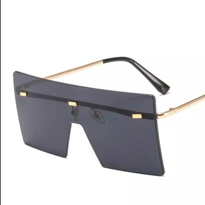 Black polarized sunglasses with a rectangular frame and gold arms