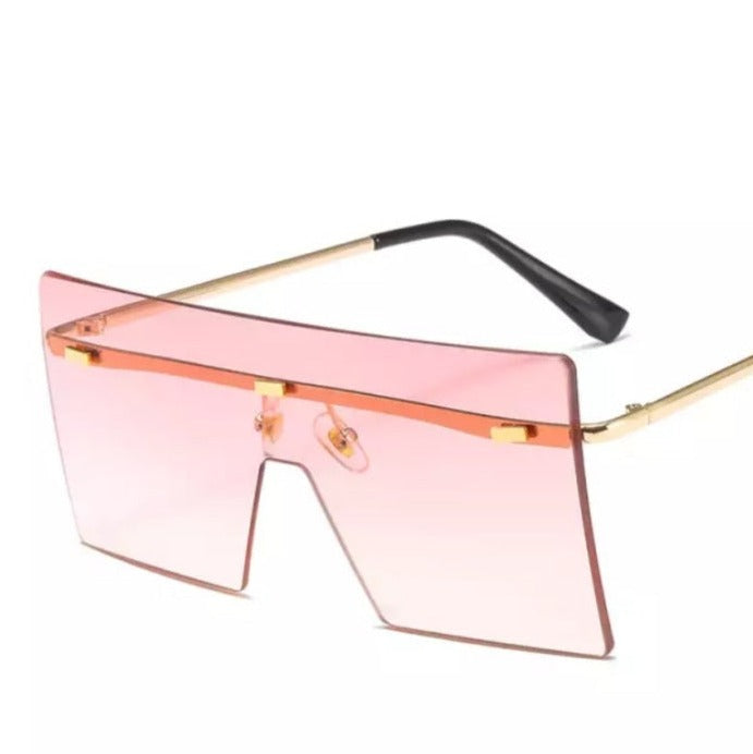 Pink sunglasses with rectangular frame and gold arms
